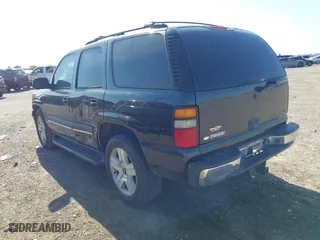 2004 Chevrolet Tahoe LT with VIN 1GNEC13ZX4R102265, listed as a IAAI auction lot 41812826 with 255,239 mi miles. Bid and sale history available at carsss.com. Image 3.
