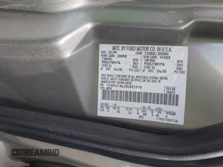 1999 Ford Expedition XLT z VIN 1FMPU18L3XLB21018, wystawiony jako IAAI lot #42003908 z przebiegiem Nie podano mil oraz . Historia ofert i sprzedaży dostępna na DreamBid. Obrazek 9.