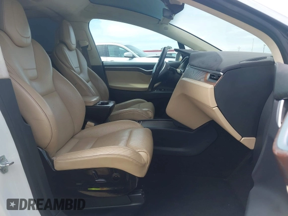 2016 Tesla Model X 70D with VIN 5YJXCBE24GF002020, listed as a IAAI auction lot 41799528 with 149,556 mi miles. Bid and sale history available at carsss.com. Image 5.