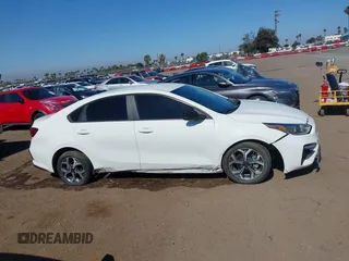 2021 Kia Forte LXS with VIN 3KPF24AD0ME322812, listed as a IAAI auction lot 42317017 with 86,216 mi miles and . Bid and sale history available at DreamBid. Image 13.