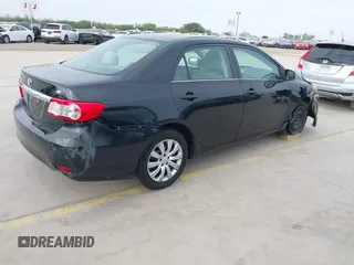 2013 Toyota Corolla L with VIN 5YFBU4EE9DP148748, listed as a IAAI auction lot 40919169 with 102,394 mi miles and . Bid and sale history available at DreamBid. Image 4.