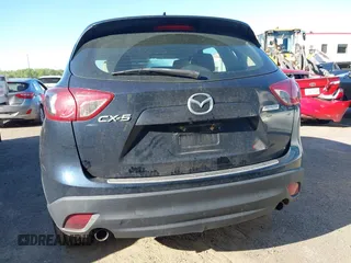 2016 Mazda CX-5 Sport with VIN JM3KE2BY3G0657904, listed as a IAAI auction lot 42127897 with 153,855 mi miles. Bid and sale history available at carsss.com. Image 16.