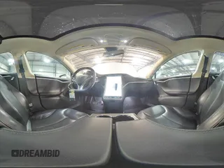 2014 Tesla Model S 60 with VIN 5YJSA1H15EFP51239, listed as a Copart auction lot 59214485 with 153,554 mi miles and Salvage title. Bid and sale history available at DreamBid. Image 14.