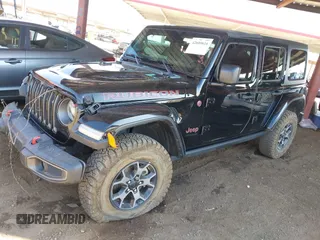 2019 Jeep Wrangler Unlimited Rubicon with VIN 1C4HJXFN5KW522991, listed as a IAAI auction lot 42609616 with 111,844 mi miles and . Bid and sale history available at DreamBid. Image 19.