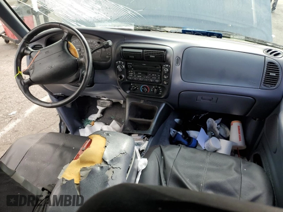 1998 Ford Explorer XL z VIN 1FMZU34EXWZA13244, wystawiony jako Copart lot #54456095 z przebiegiem 192 527 mil mil oraz Szkoda całkowita • Salvage title. Historia ofert i sprzedaży dostępna na DreamBid. Obrazek 8.