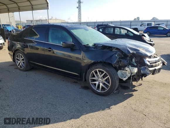 2012 Ford Fusion SEL with VIN 3FAHP0JG9CR238353, listed as a Copart auction lot 48035765 with 144,158 mi miles and Salvage Title. Bid and sale history available at carsss.com. Image 4.