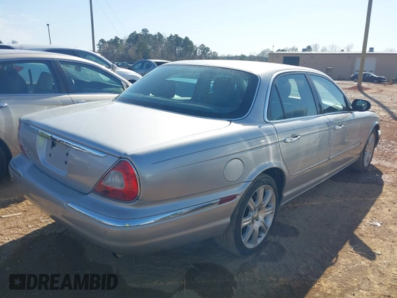 2004 Jaguar XJ with VIN SAJEA71C94SG01362, listed as a IAAI auction lot 41829470 with 172,545 mi miles. Bid and sale history available at carsss.com. Image 4.