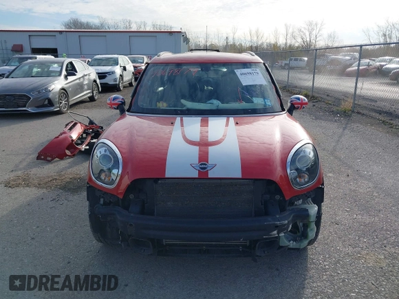 2015 MINI Cooper Countryman S with VIN WMWZC5C51FWP49282, listed as a IAAI auction lot 40698179 with 63,037 mi miles. Bid and sale history available at carsss.com. Image 13.