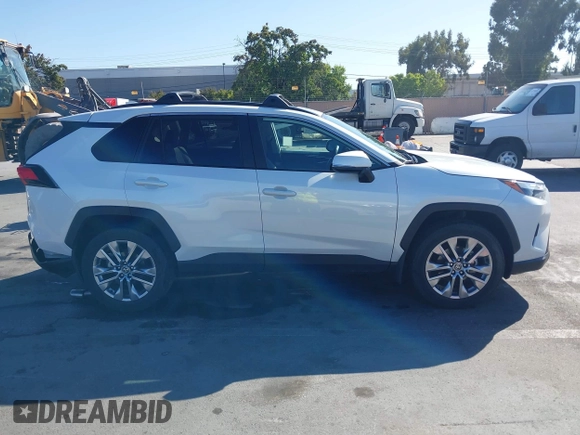 2023 Toyota RAV4 XLE Premium with VIN 2T3C1RFV7PW299428, listed as a IAAI auction lot 42527306 with 9,853 mi miles and . Bid and sale history available at DreamBid. Image 13.