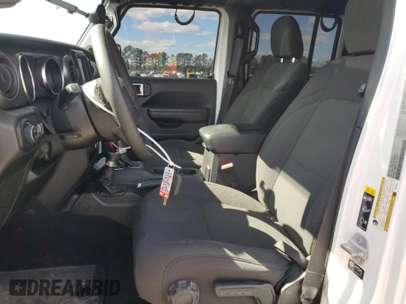 2023 Jeep Gladiator Sport S with VIN 1C6HJTAG4PL556387, listed as a Copart auction lot 47453305 with 35,611 mi miles and Salvage title. Bid and sale history available at DreamBid. Image 7.