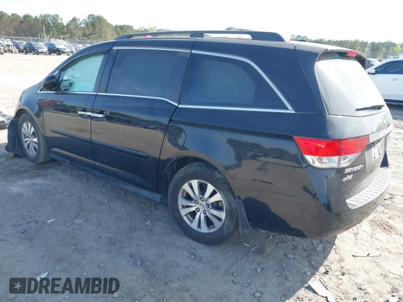 2015 Honda Odyssey EX-L with VIN 5FNRL5H65FB088106, listed as a IAAI auction lot 41880915 with 176,539 mi miles and . Bid and sale history available at carsss.com. Image 3.