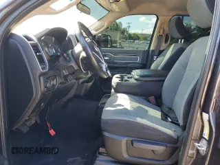 2019 Ram 2500 Big Horn with VIN 3C6UR5JLXKG606957, listed as a Copart auction lot 57713014 with 102,399 mi miles and Salvage Title. Bid and sale history available at carsss.com. Image 7.