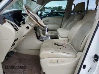 2012 Infiniti QX56 7-passenger with VIN JN8AZ2NE5C9017245, listed as a Copart auction lot 79654654 with 153,294 mi miles and Salvage Title. Bid and sale history available at carsss.com. Image 7.