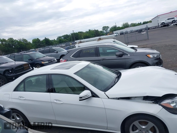 2014 Mercedes-Benz E 350 Luxury with VIN WDDHF8JB5EB040219, listed as a IAAI auction lot 42771799 with 65,454 mi miles and . Bid and sale history available at DreamBid. Image 13.