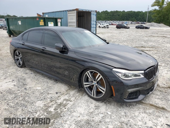 2019 BMW 7 Series 750i with VIN WBA7F0C57KGM25906, listed as a Copart auction lot 62728443 with 61,561 mi miles. Bid and sale history available at carsss.com. Image 4.