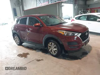 2020 Hyundai Tucson SE z VIN KM8J2CA41LU215252, wystawiony jako IAAI lot #42438157 z przebiegiem 64 613 mil mil oraz . Historia ofert i sprzedaży dostępna na DreamBid. Obrazek 1.