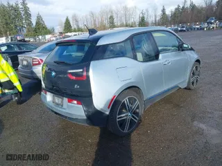 2014 BMW i3 with VIN WBY1Z4C54EV275808, listed as a IAAI auction lot 41659125 with NaN miles. Bid and sale history available at carsss.com. Image 4.