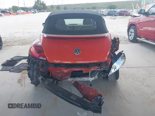 2018 Volkswagen Beetle S with VIN 3VW5DAAT3JM506460, listed as a IAAI auction lot 41556365 with 49,674 mi miles and . Bid and sale history available at DreamBid. Image 16.