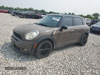 2011 MINI Countryman S with VIN WMWZC3C52BWH97732, listed as a Copart auction lot 58520305 with 143,512 mi miles and Salvage title. Bid and sale history available at DreamBid. Image 1.