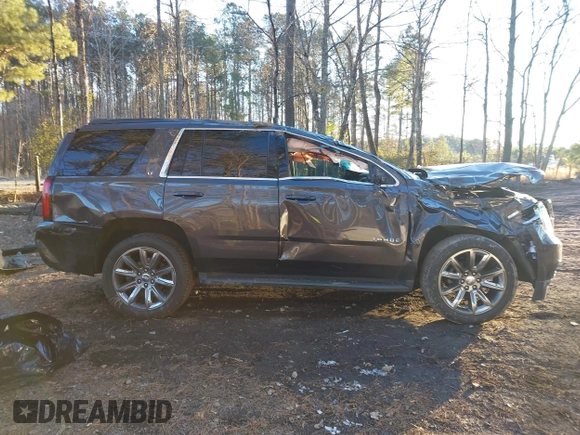 2018 Chevrolet Tahoe LT with VIN 1GNSKBKC7JR234467, listed as a IAAI auction lot 41276741 with 132,327 mi miles and . Bid and sale history available at DreamBid. Image 14.