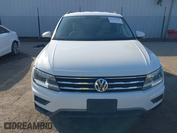 2020 Volkswagen Tiguan S z VIN 3VV1B7AX4LM098567, wystawiony jako IAAI lot #41504191 z przebiegiem 106 012 mil mil oraz . Historia ofert i sprzedaży dostępna na DreamBid. Obrazek 13.