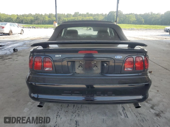 1996 Ford Mustang Cobra with VIN 1FALP46V0TF188786, listed as a Copart auction lot 57933355 with 36,931 mi miles and Salvage title. Bid and sale history available at DreamBid. Image 6.