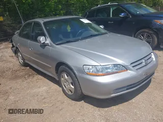 2002 Honda Accord EX z VIN 1HGCG16552A056385, wystawiony jako IAAI lot #42148995 z przebiegiem 216 067 mil mil oraz . Historia ofert i sprzedaży dostępna na DreamBid. Obrazek 1.