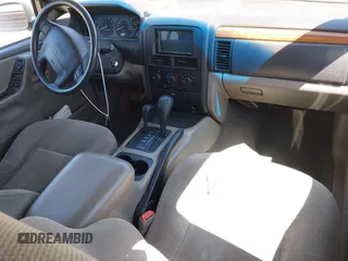 1999 Jeep Grand Cherokee Laredo with VIN 1J4GW58S8XC524502, listed as a IAAI auction lot 42193506 with 147,920 mi miles and . Bid and sale history available at DreamBid. Image 22.