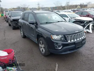 2016 Jeep Compass High Altitude Edition with VIN 1C4NJDEB4GD695249, listed as a IAAI auction lot 42030142 with 155,849 mi miles. Bid and sale history available at carsss.com. Image 1.