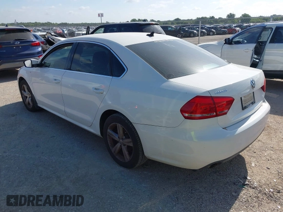 2014 Volkswagen Passat Wolfsburg Edition with VIN 1VWAS7A30EC053025, listed as a IAAI auction lot 42579059 with 168,446 mi miles and . Bid and sale history available at DreamBid. Image 3.