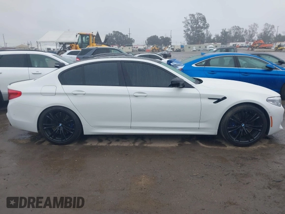 2019 BMW M5 Competition z VIN WBSJF0C52KB447102, wystawiony jako IAAI lot #41778593 z przebiegiem 31 030 mil mil oraz . Historia ofert i sprzedaży dostępna na DreamBid. Obrazek 13.