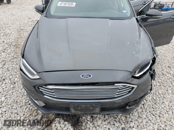 2018 Ford Fusion Hybrid Titanium with VIN 3FA6P0RU8JR176488, listed as a Copart auction lot 47187335 with 102,615 mi miles and Salvage Title. Bid and sale history available at carsss.com. Image 12.