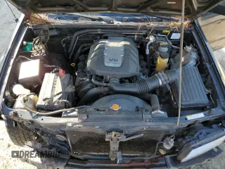 2000 Isuzu Rodeo S with VIN 4S2CK58W7Y4309261, listed as a Copart auction lot 54000775 with 187,949 mi miles and Salvage title. Bid and sale history available at DreamBid. Image 12.