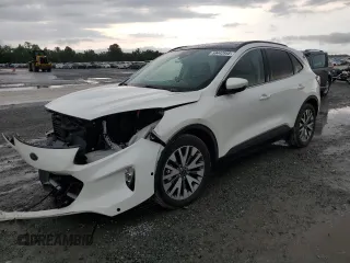 2020 Ford Escape Titanium Hybrid with VIN 1FMCU0DZ7LUA84837, listed as a Copart auction lot 59442955 with 53,258 mi miles and Salvage title. Bid and sale history available at DreamBid. Image 1.