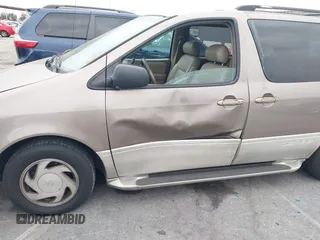 1998 Toyota Sienna LE with VIN 4T3ZF13C4WU047568, listed as a IAAI auction lot 42062449 with 130,019 mi miles. Bid and sale history available at carsss.com. Image 6.