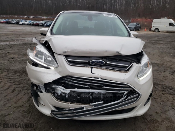 2017 Ford C-Max Energi Titanium with VIN 1FADP5FU6HL107557, listed as a Copart auction lot 36993843 with 67,327 mi miles. Bid and sale history available at carsss.com. Image 5.