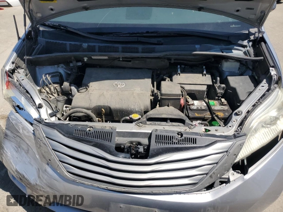 2014 Toyota Sienna XLE with VIN 5TDYK3DCXES496657, listed as a Copart auction lot 60498015 with 178,486 mi miles and Salvage title. Bid and sale history available at DreamBid. Image 12.
