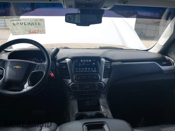 2017 Chevrolet Tahoe LT with VIN 1GNSKBKCXHR350028, listed as a IAAI auction lot 41684954 with 117,261 mi miles and . Bid and sale history available at DreamBid. Image 22.