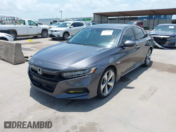 2019 Honda Accord Touring with VIN 1HGCV2F93KA013002, listed as a IAAI auction lot 42519920 with 76,841 mi miles and . Bid and sale history available at DreamBid. Image 2.