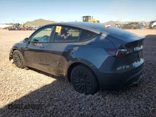 2022 Tesla Model Y Long Range z VIN 7SAYGDEE3NF543705, wystawiony jako Copart lot #50244955 z przebiegiem 59 063 mil mil oraz Szkody całkowita. Historia ofert i sprzedaży dostępna na DreamBid. Obrazek 2.