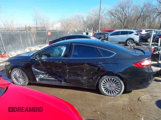 2013 Ford Fusion Titanium Hybrid with VIN 3FA6P0RU5DR339716, listed as a IAAI auction lot 41405835 with 197,840 mi miles. Bid and sale history available at carsss.com. Image 14.