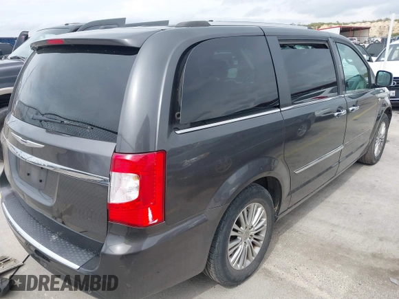 2014 Chrysler Town & Country Touring L with VIN 2C4RC1CG7ER300693, listed as a IAAI auction lot 41849463 with 174,203 mi miles and . Bid and sale history available at carsss.com. Image 4.