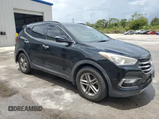 2017 Hyundai Santa Fe 2.4L with VIN 5NMZUDLB8HH048454, listed as a Copart auction lot 64727415 with 82,828 mi miles and Salvage title. Bid and sale history available at DreamBid. Image 4.