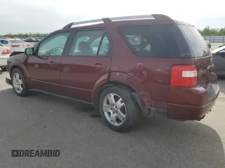 2005 Ford Freestyle Limited with VIN 1FMZK06165GA74986, listed as a Copart auction lot 53398485 with 148,459 mi miles and Salvage title. Bid and sale history available at DreamBid. Image 2.