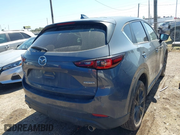 2023 Mazda CX-5 2.5 S Preferred Package with VIN JM3KFBCM6P0266870, listed as a IAAI auction lot 41635476 with 7,511 mi miles. Bid and sale history available at carsss.com. Image 4.