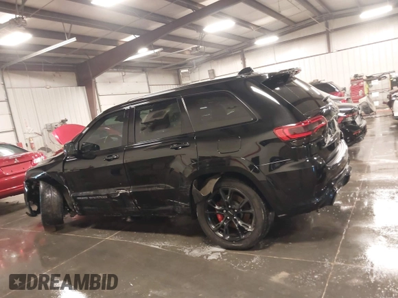 2017 Jeep Grand Cherokee SRT with VIN 1C4RJFDJ9HC739324, listed as a IAAI auction lot 40898998 with 92,547 mi miles. Bid and sale history available at carsss.com. Image 14.