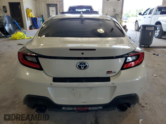 2023 Toyota GR86 with VIN JF1ZNBC12P8751904, listed as a Copart auction lot 67633554 with 0 mi miles and Salvage Title. Bid and sale history available at carsss.com. Image 6.