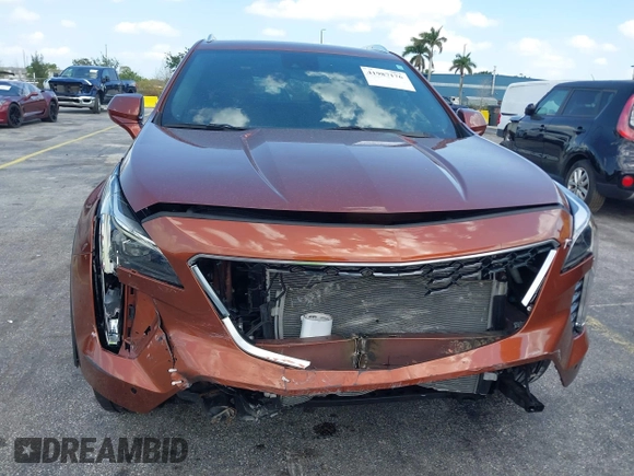 2019 Cadillac XT4 FWD Premium Luxury z VIN 1GYFZCR41KF183507, wystawiony jako IAAI lot #41987176 z przebiegiem 64 803 mil mil oraz . Historia ofert i sprzedaży dostępna na DreamBid. Obrazek 12.