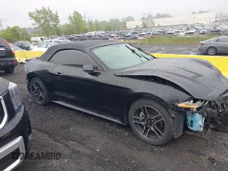 2020 Ford Mustang EcoBoost z VIN 1FATP8UH7L5131625, wystawiony jako IAAI lot #42295906 z przebiegiem 74 572 mil mil oraz . Historia ofert i sprzedaży dostępna na DreamBid. Obrazek 12.