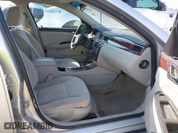 2010 Chevrolet Impala LS with VIN 2G1WA5EK4A1161609, listed as a IAAI auction lot 41889517 with 124,484 mi miles and . Bid and sale history available at DreamBid. Image 5.